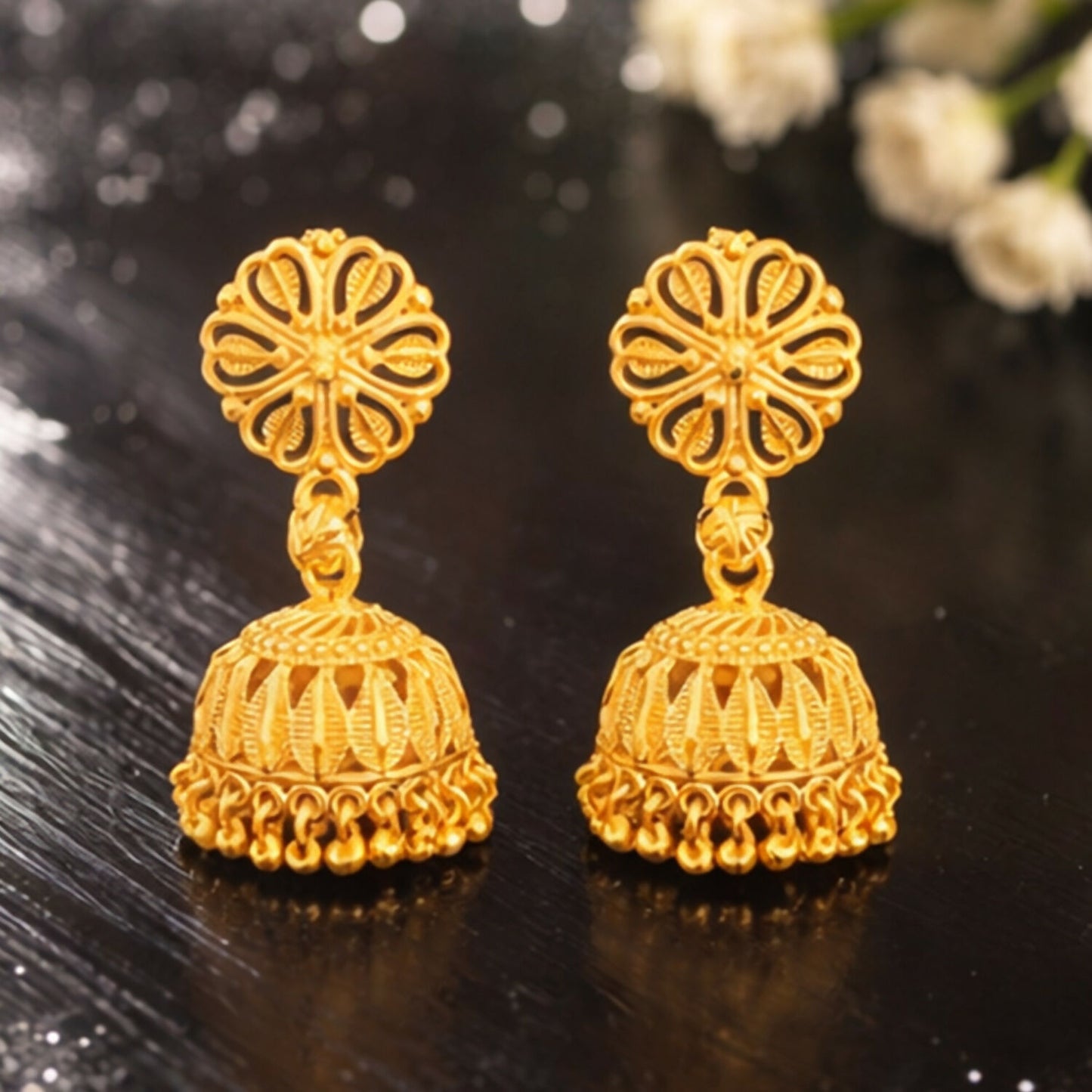 Side view of lightweight gold plated jhumka earrings for women