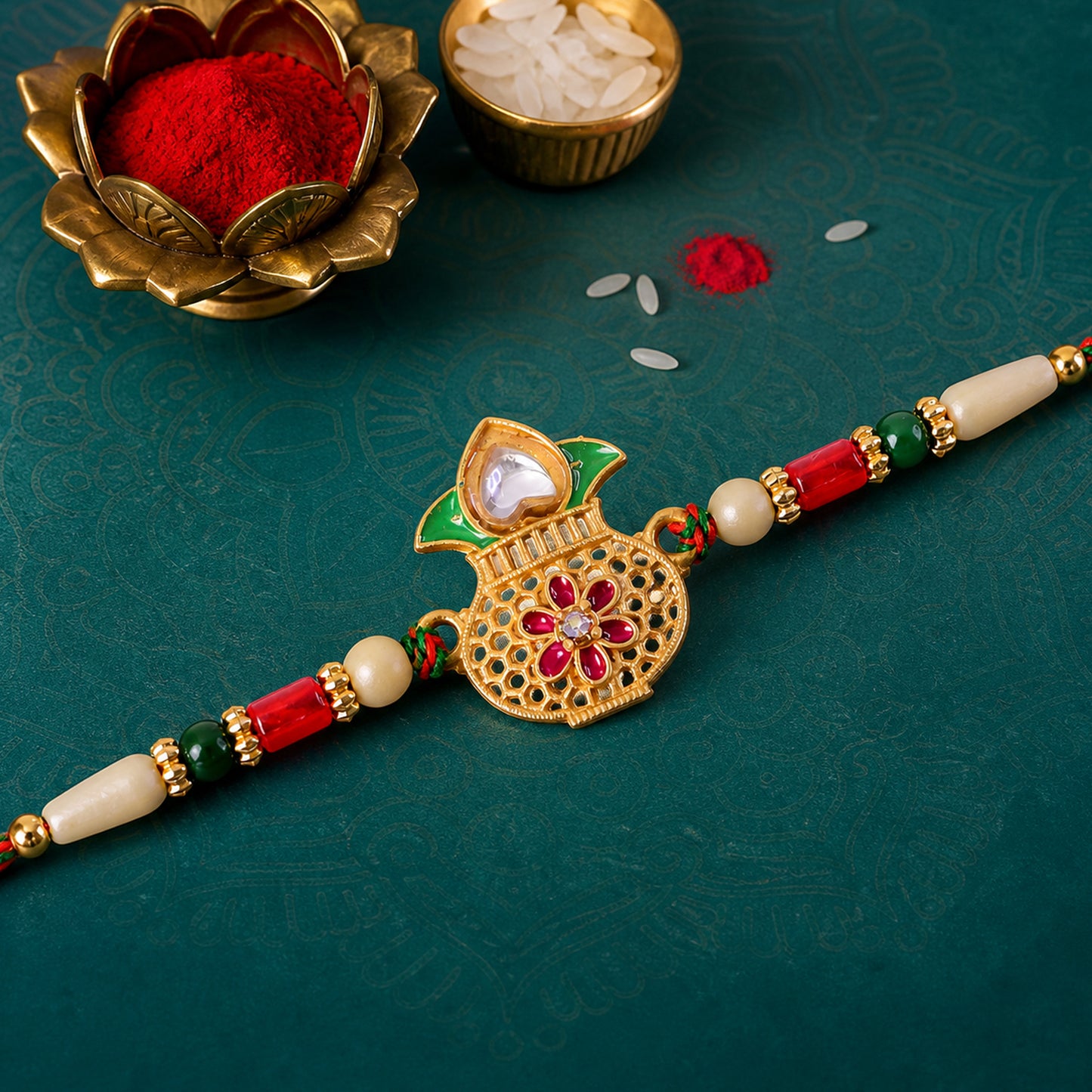 Classic Rakhi featuring Kalash Charm and red stone accents in chain look for Gift Use