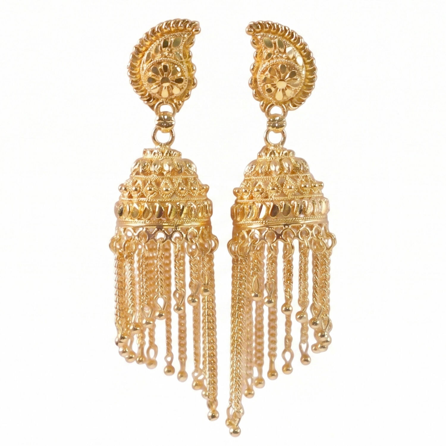 Detailed shot of pearl drops on gold-plated jhumka earrings