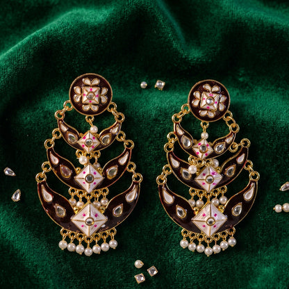 Black meenakari earring showcasing layered artistic design