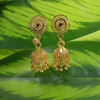 Close-up of gold plated jhumka earrings showing detailed bead craftsmanship