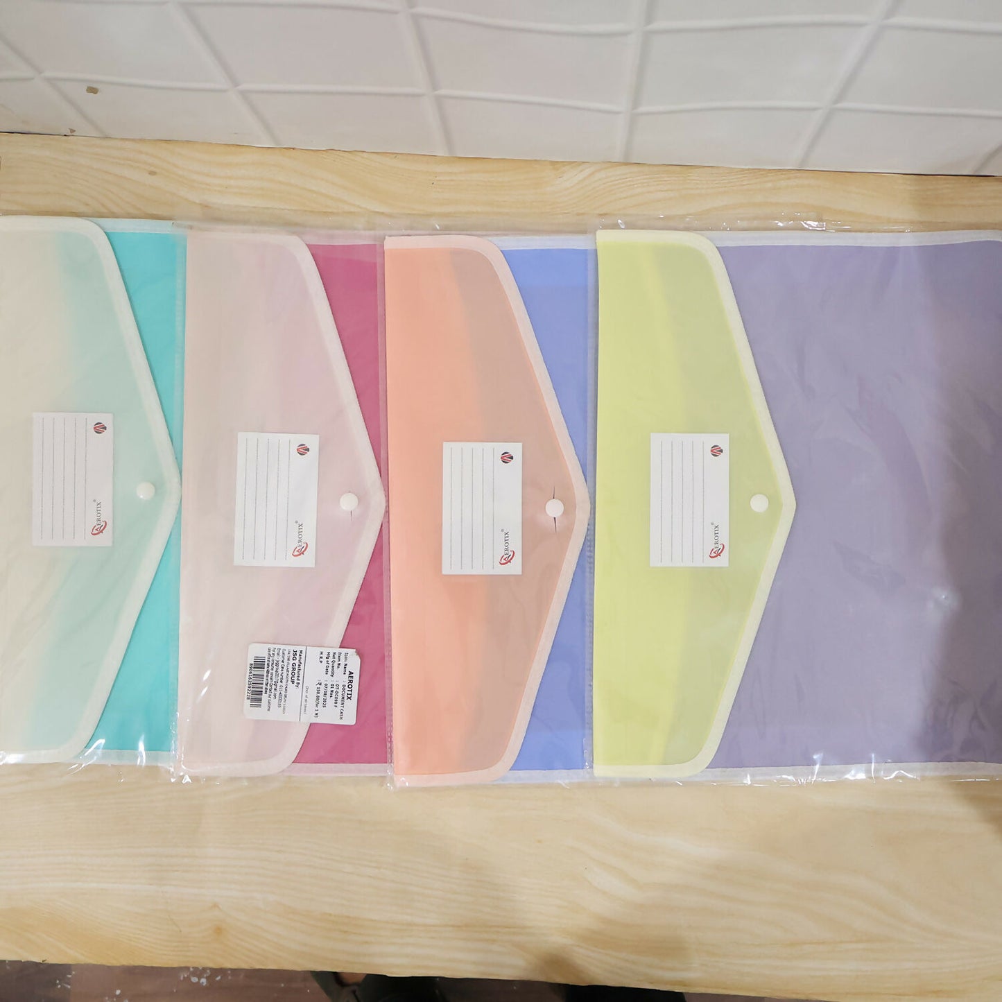 Pastel expandable document folder edges with detailed stitching