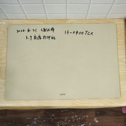 Solid rectangular floor mat on a clean floor surface