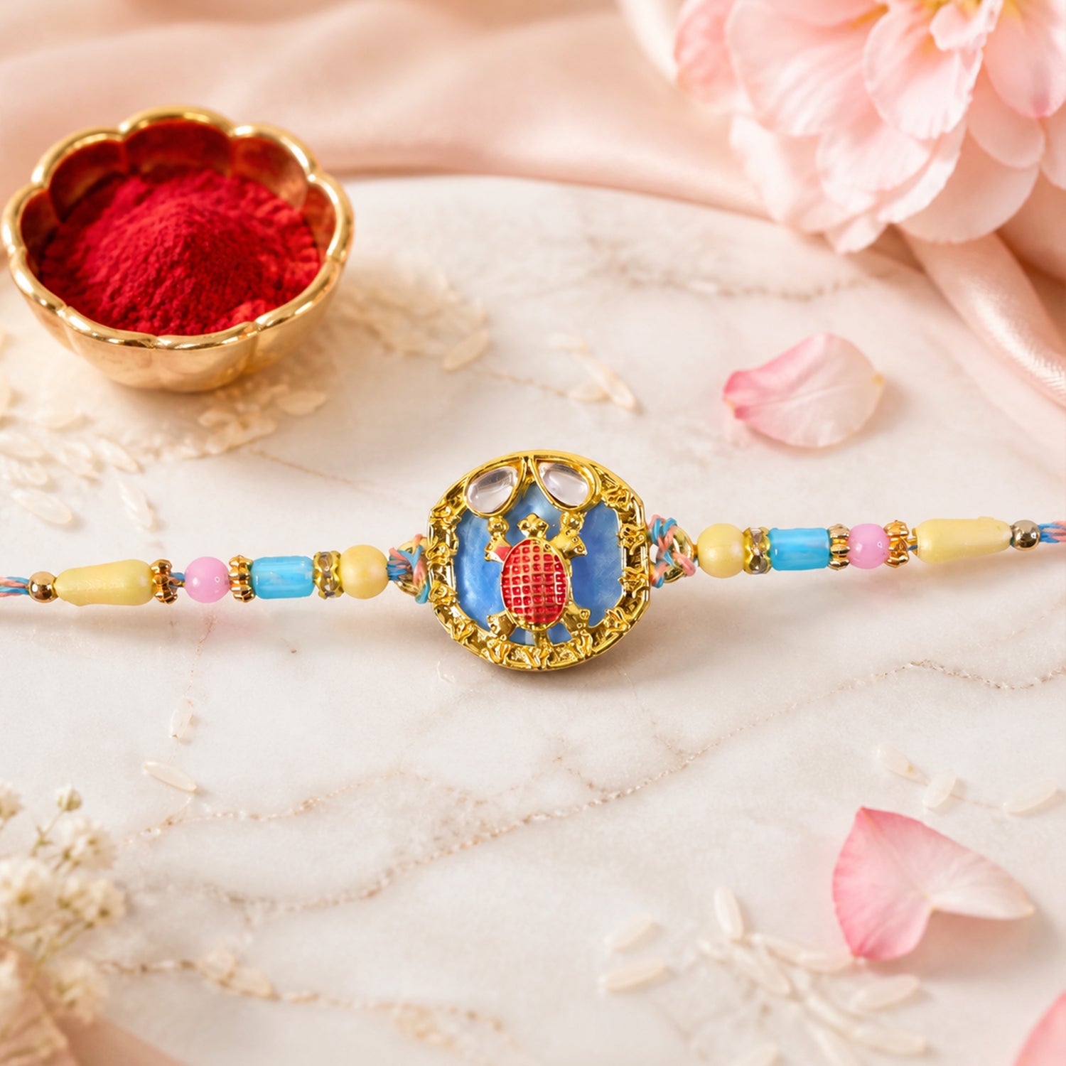 Elegant Blue Designer Rakhi for Brother with Golden Pendant & Premium Bead Work