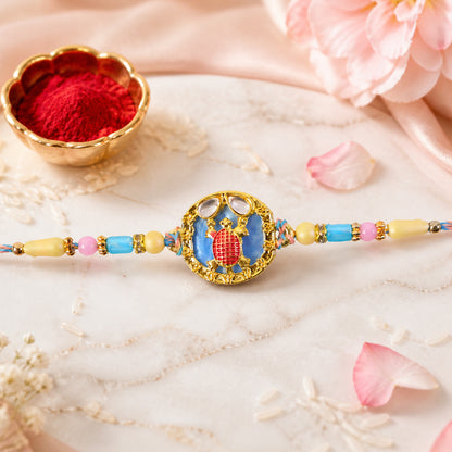 Elegant Blue Designer Rakhi for Brother with Golden Pendant & Premium Bead Work