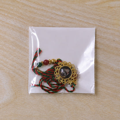 Lord Jagannath Pendant Rakhi with Red Beads
