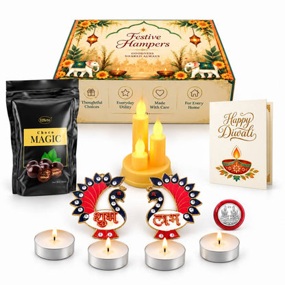 A festive Diwali hamper with sweets, LED candles, tealights, peacock decorations, and a silver coin.