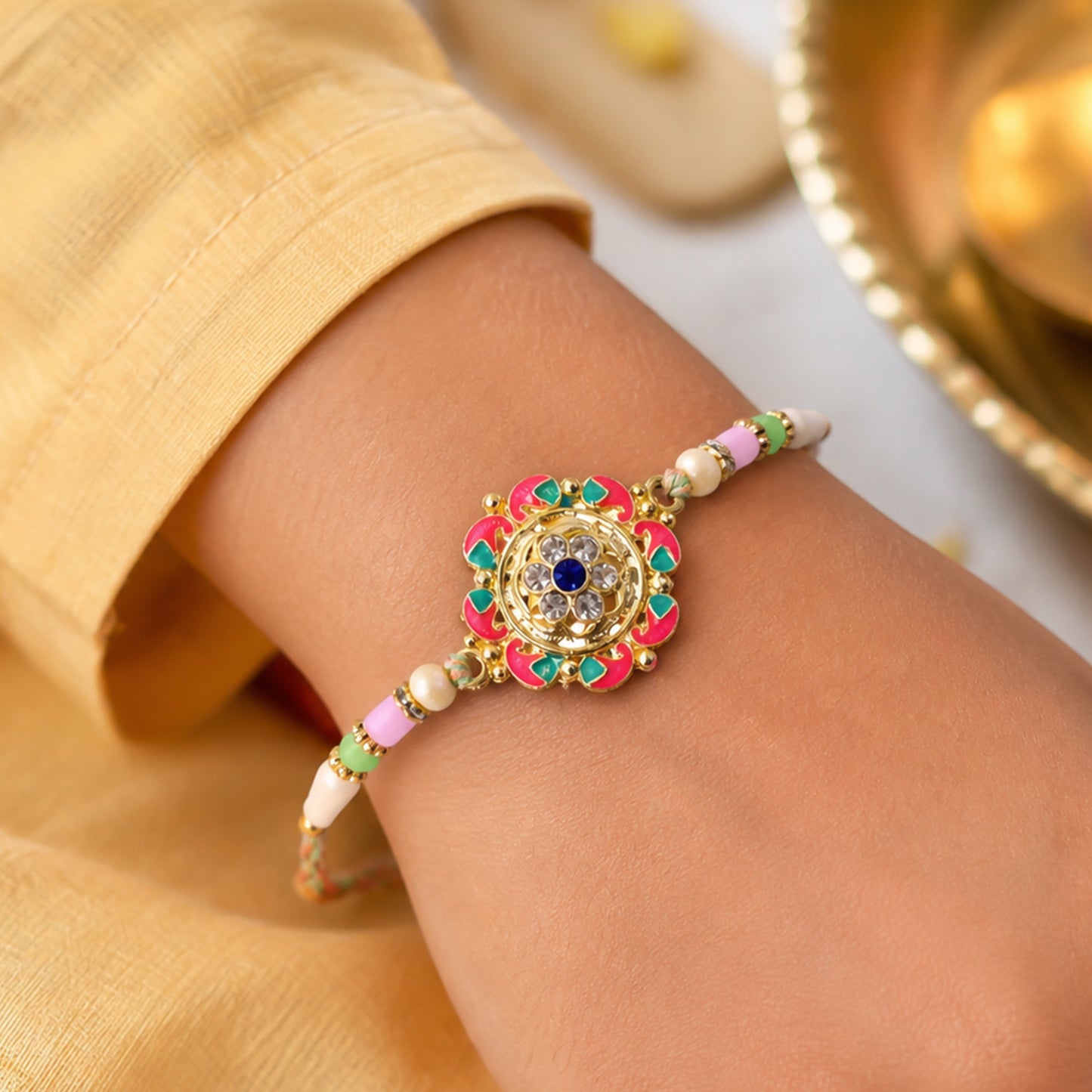 Paisley Petal Kundan Flower Pendant Rakhi with Pearl Beads
