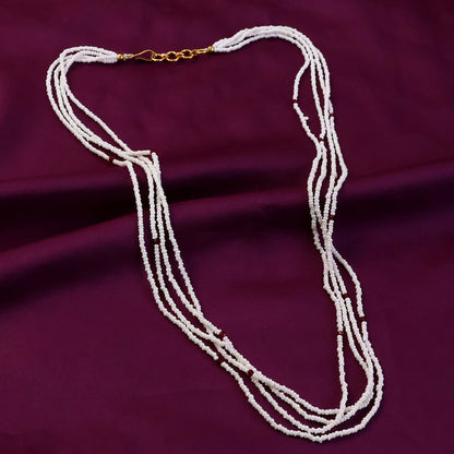 Side view of elegant white beaded mala necklace