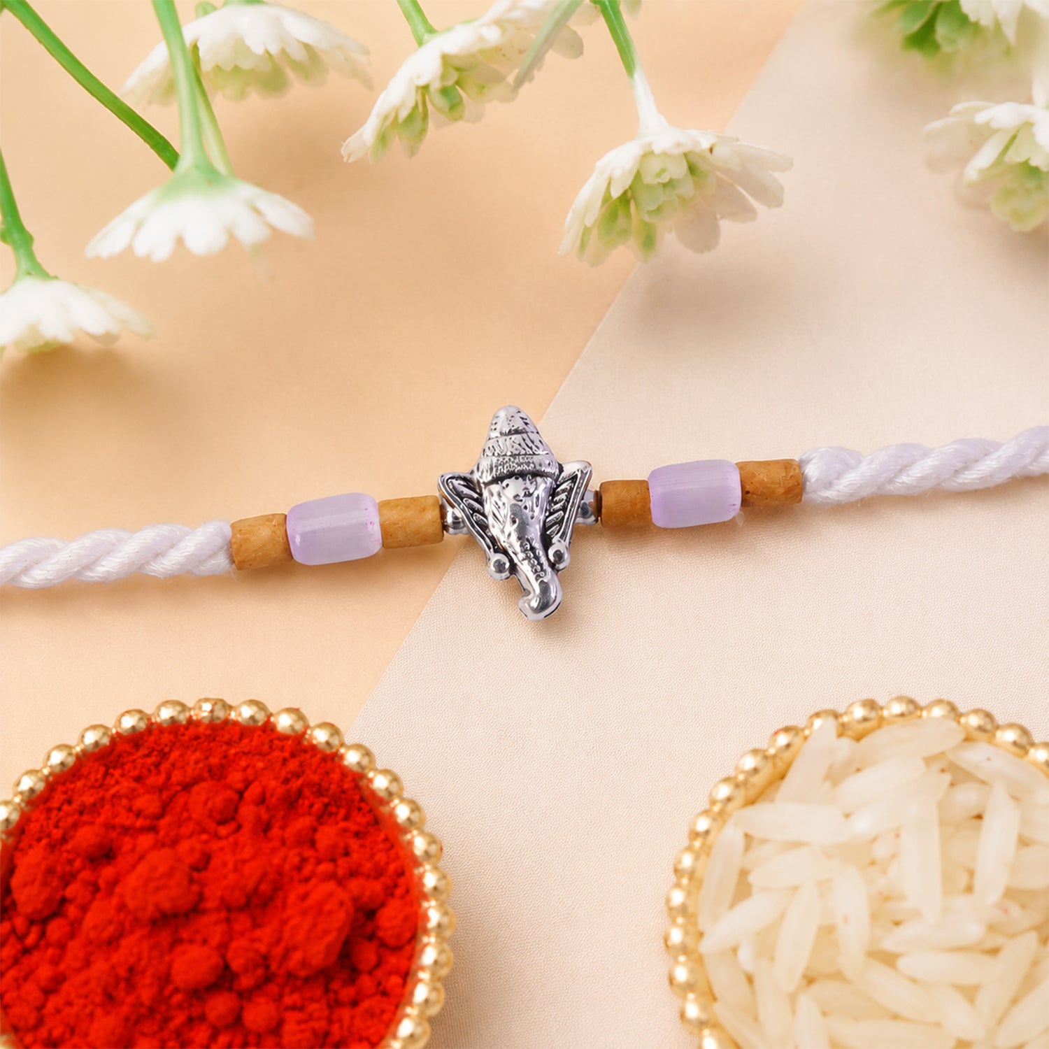 Elegant Diamond Look Rakhi with Shiny Centre and Refined Raksha Bandhan Styling