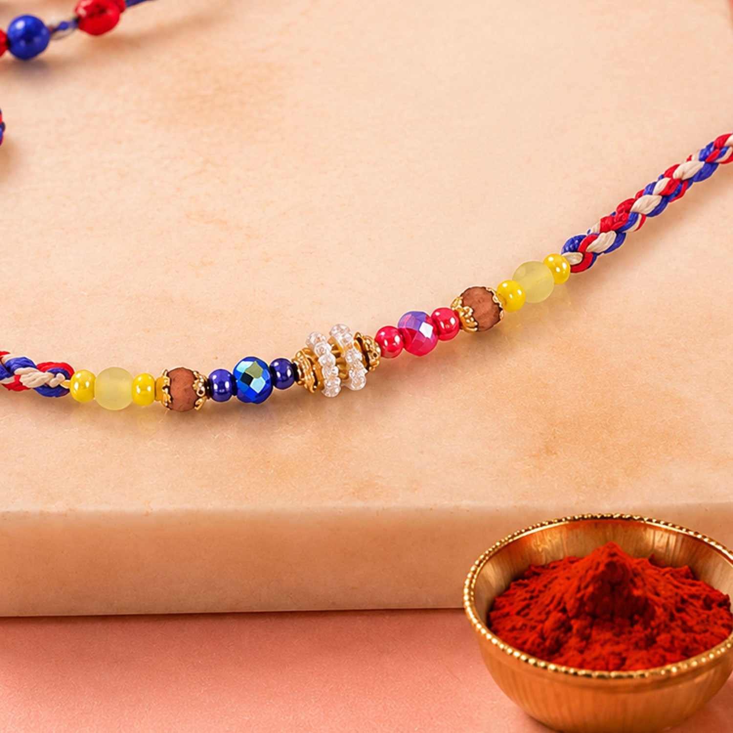 Rainbow Beaded Charm Rakhi with Colorful Festive Style and Playful Bracelet Look
