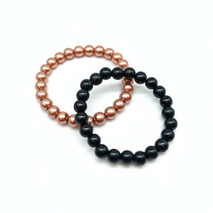 Stylish unisex bracelet showing gold-tone details