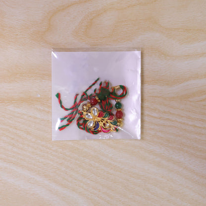 Multicolor Floral Kundan Pendant Rakhi with Green Beads