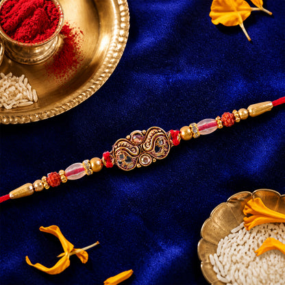Oxidized Gold Paisley Medallion Rakhi with Rudraksha and Pearl Beads