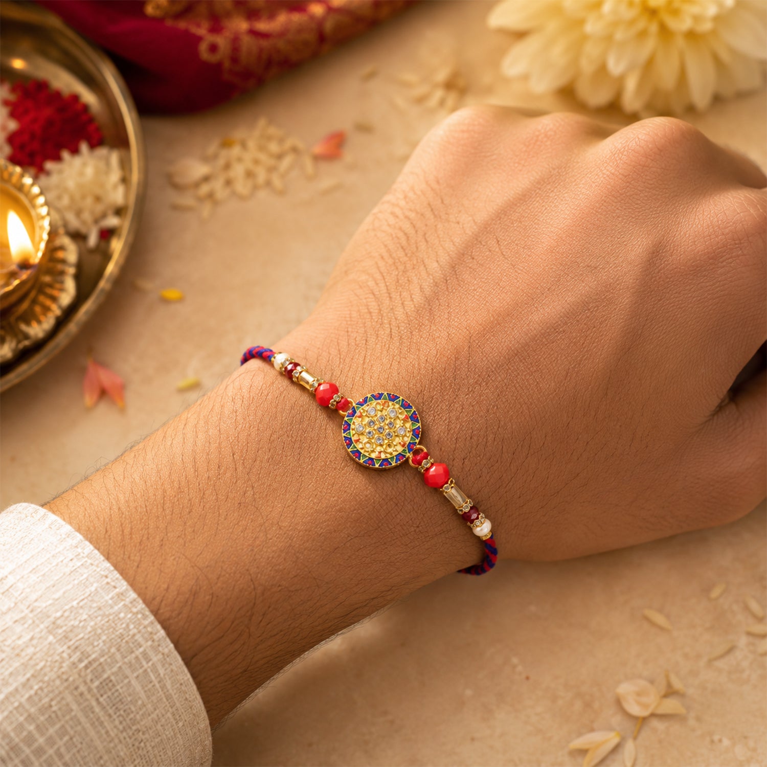 Stone Studded Round Bhai Bhabhi Lumba Rakhi with Pearl Hangings