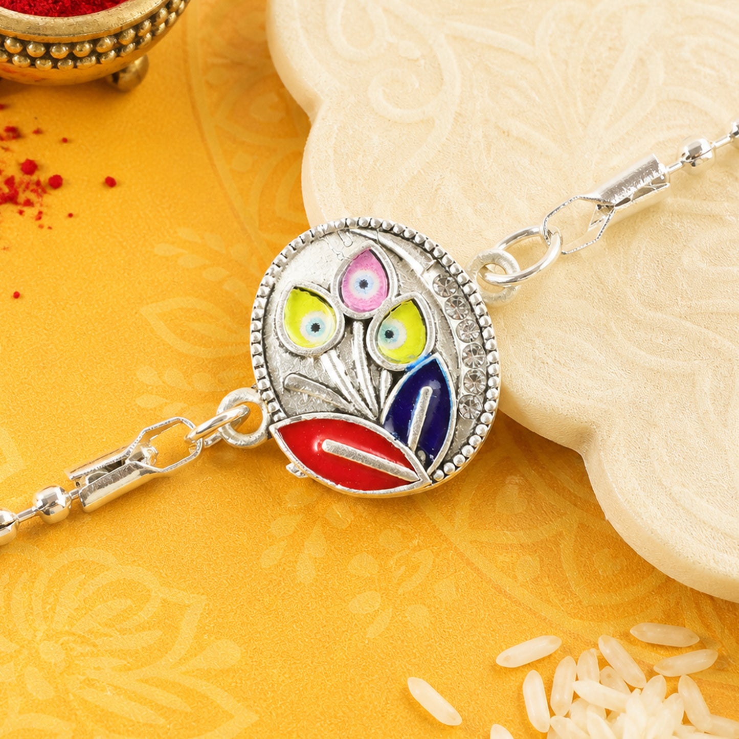 Leaft Evil Eye Motif Enamel Crystal Studded Silver Chain Designer Rakhi
