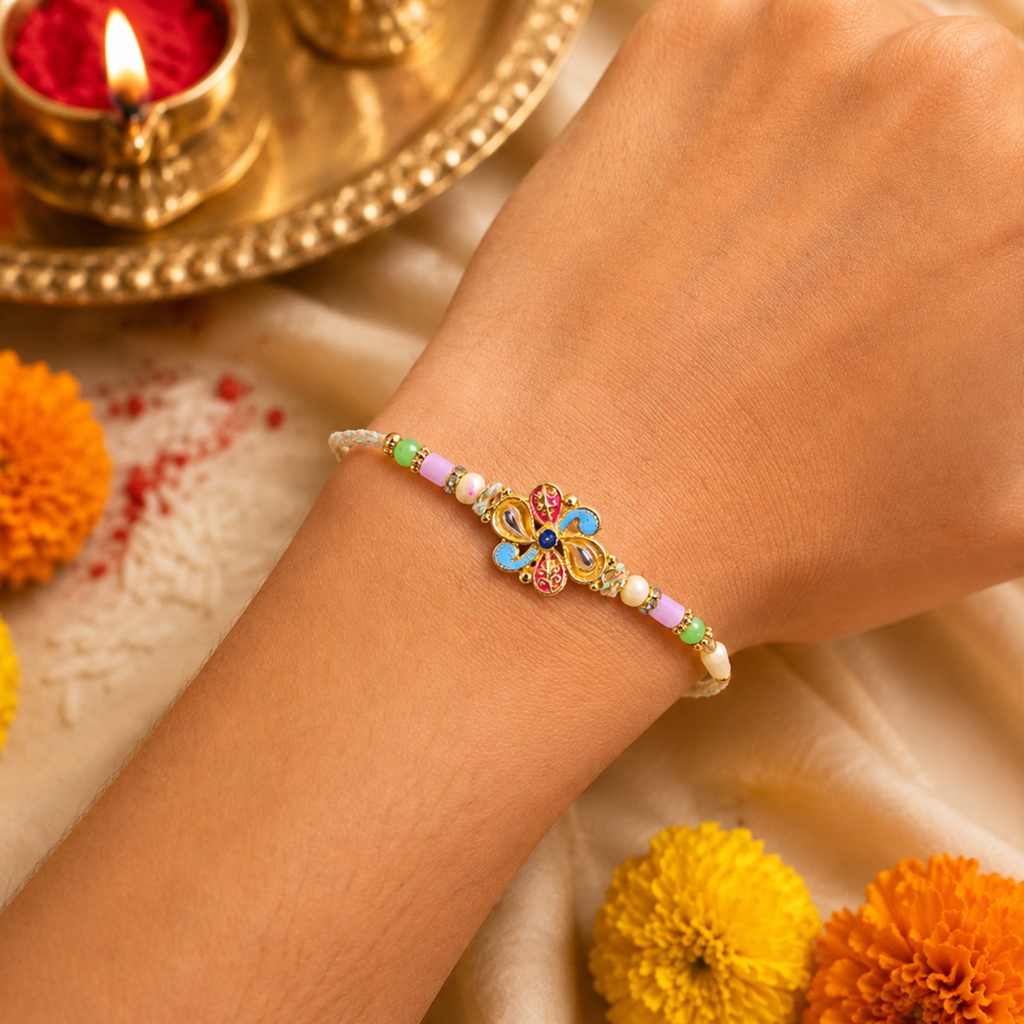 Ornate Rakhi featuring Petal Blossom Charm and bead line in gift style for Gift Use