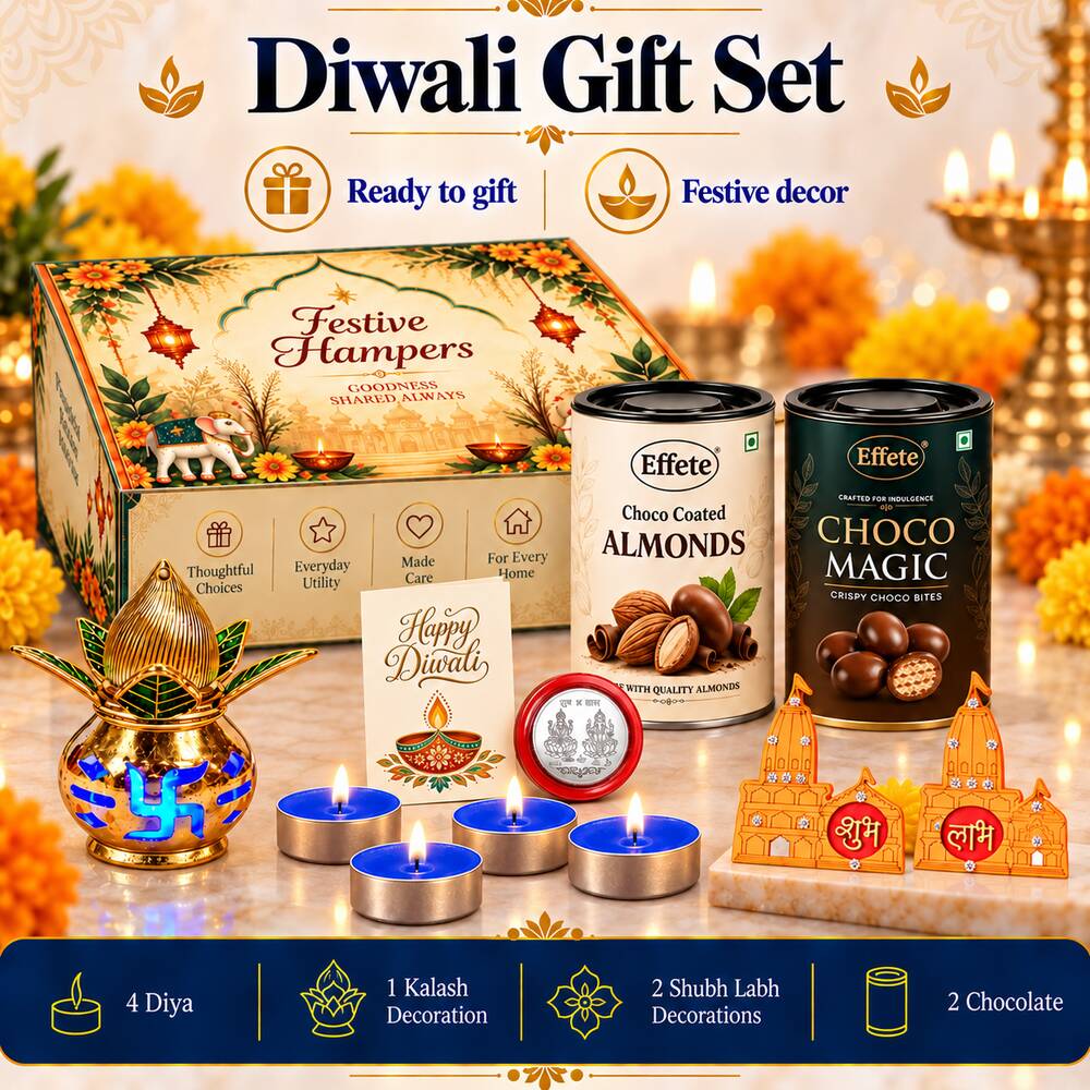 A Diwali gift set featuring a festive box, two chocolate tins, a golden kalash, four lit tealights, and decorative