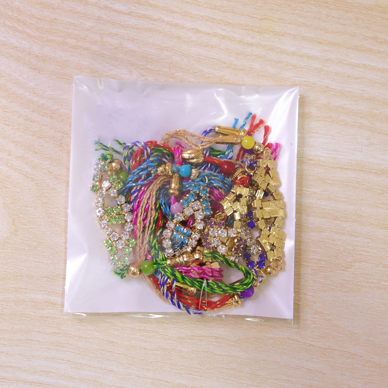 Open Marquise Frame Rakhi with AD Stonework (Pack of 6)