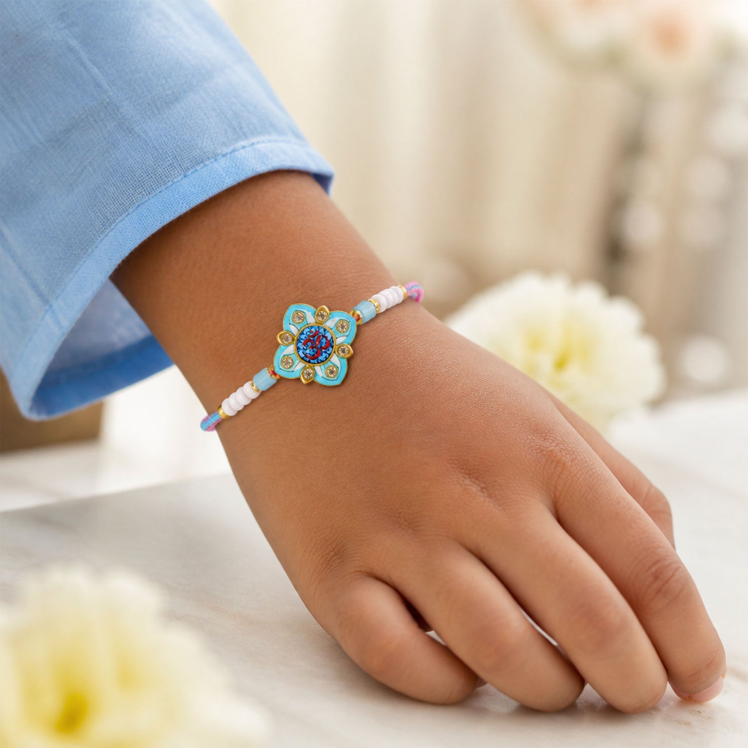 Om Printed Clover Crystal Studded Pearl Beads Bhai Bhabhi Rakhi Set