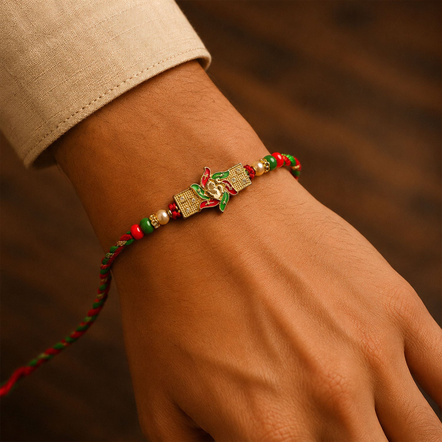Festive Red & Green Meenakari Pinwheel AD Stone Rakhi for Brother Gift