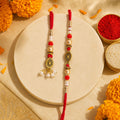Graceful Teardrop Eye Bhai Bhabhi Rakhi with Drop Pendant and Pearl Tassel for Gift