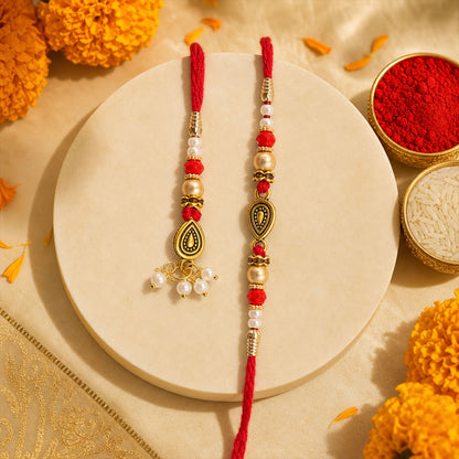Graceful Teardrop Eye Bhai Bhabhi Rakhi with Drop Pendant and Pearl Tassel for Gift