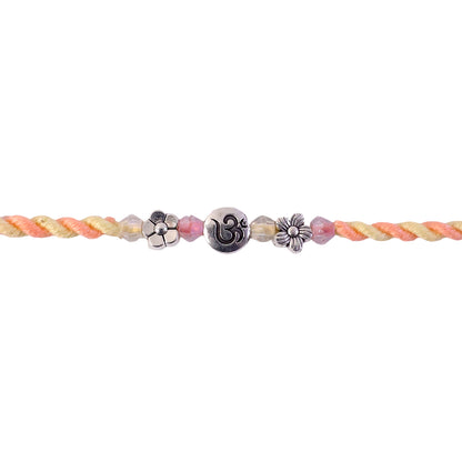 Graceful Pastel Bracelet Rakhi with Silver Centre and Delicate Raksha Bandhan Beauty