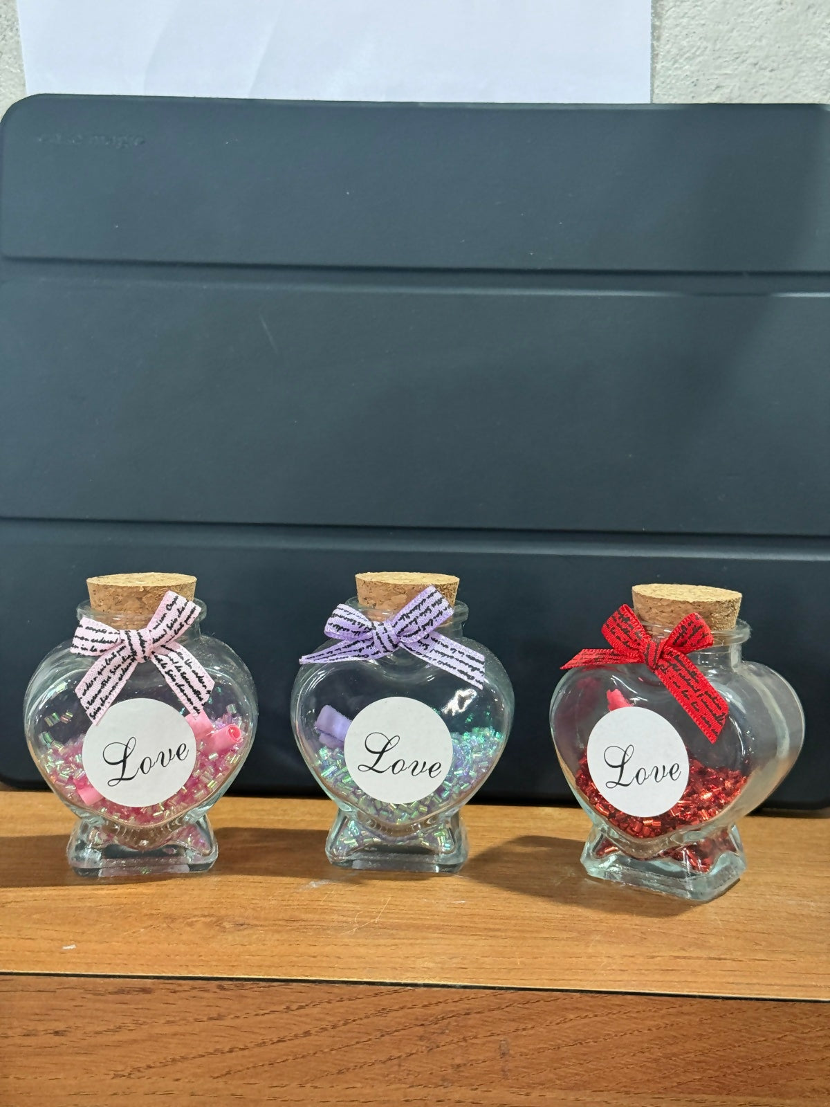 Heart Shaped Love Message Glass Bottles with Cork Lid – Set of 3 (Red, Pink & Blue) | Glitter Filled Decorative Bottles with Mini Scroll Notes | Romantic Gift Jars for Valentine’s Day, Anniversary, Birthday & Home Decor