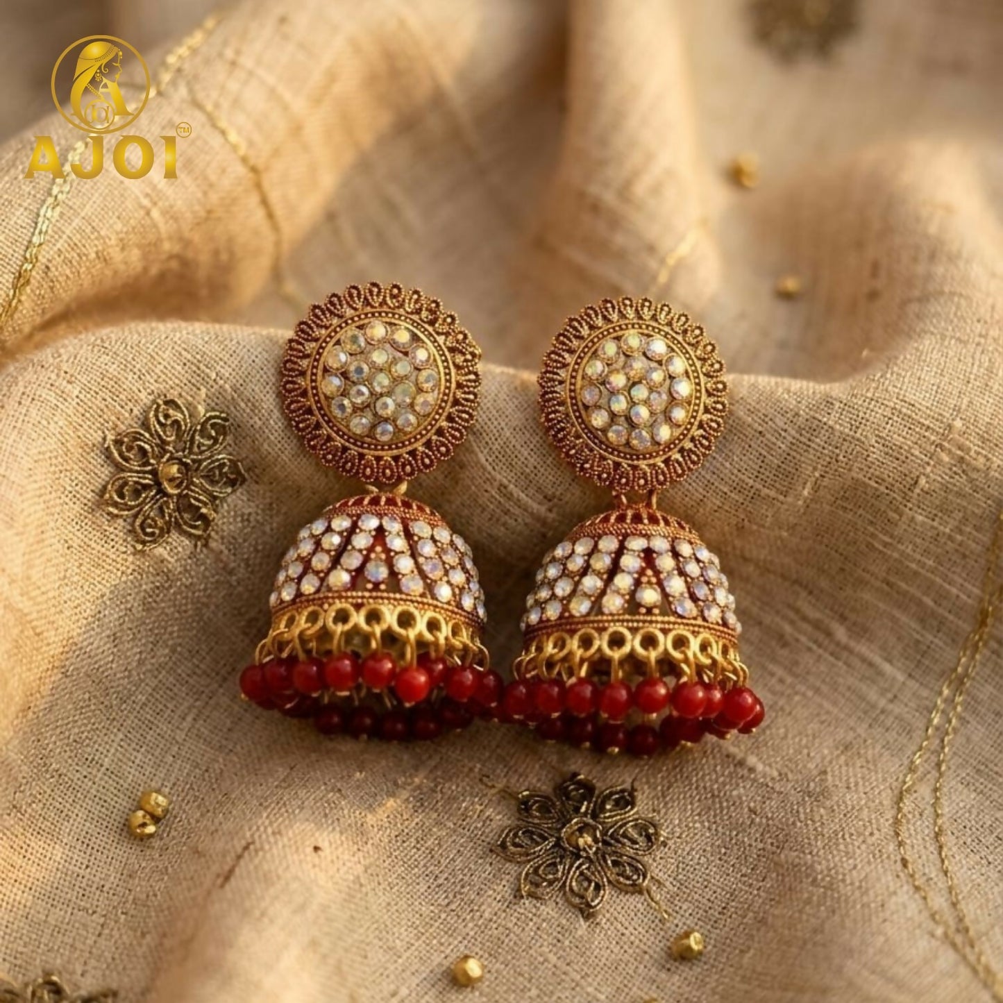Elegant Gold-Plated Pearl Jhumka Earrings with Red Bead Drops