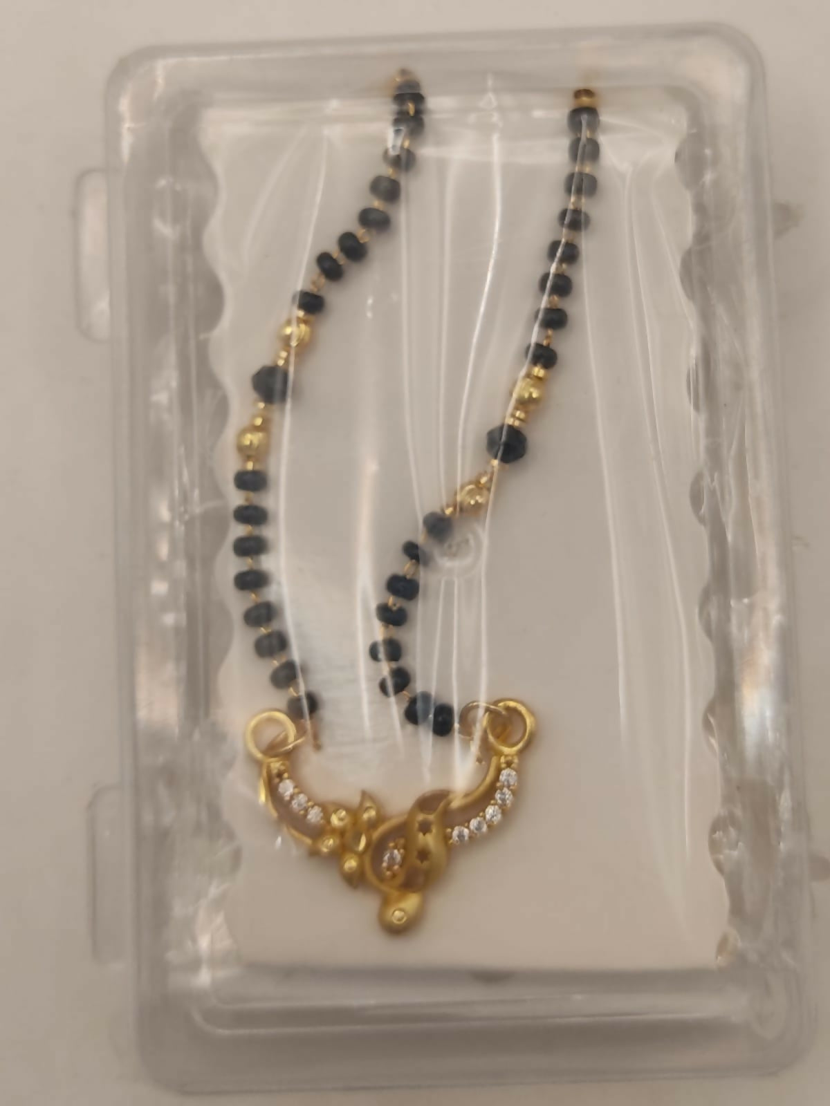 Modern Gold & AD Mangalsutra with Black Beads