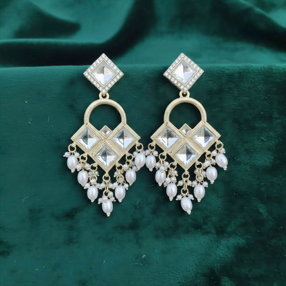 Elegant Kundan chandelier earrings with geometric diamond-shaped design and pearl clusters