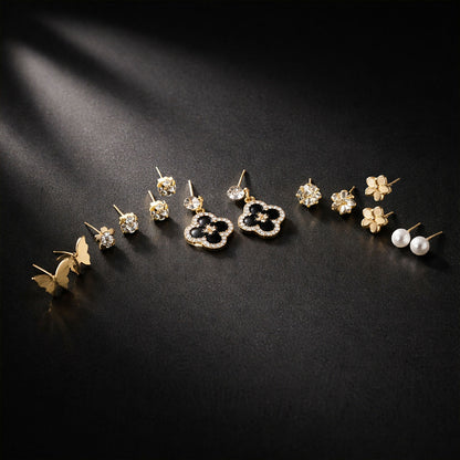 Black floral drop earrings included in the elegant gold and black combo set