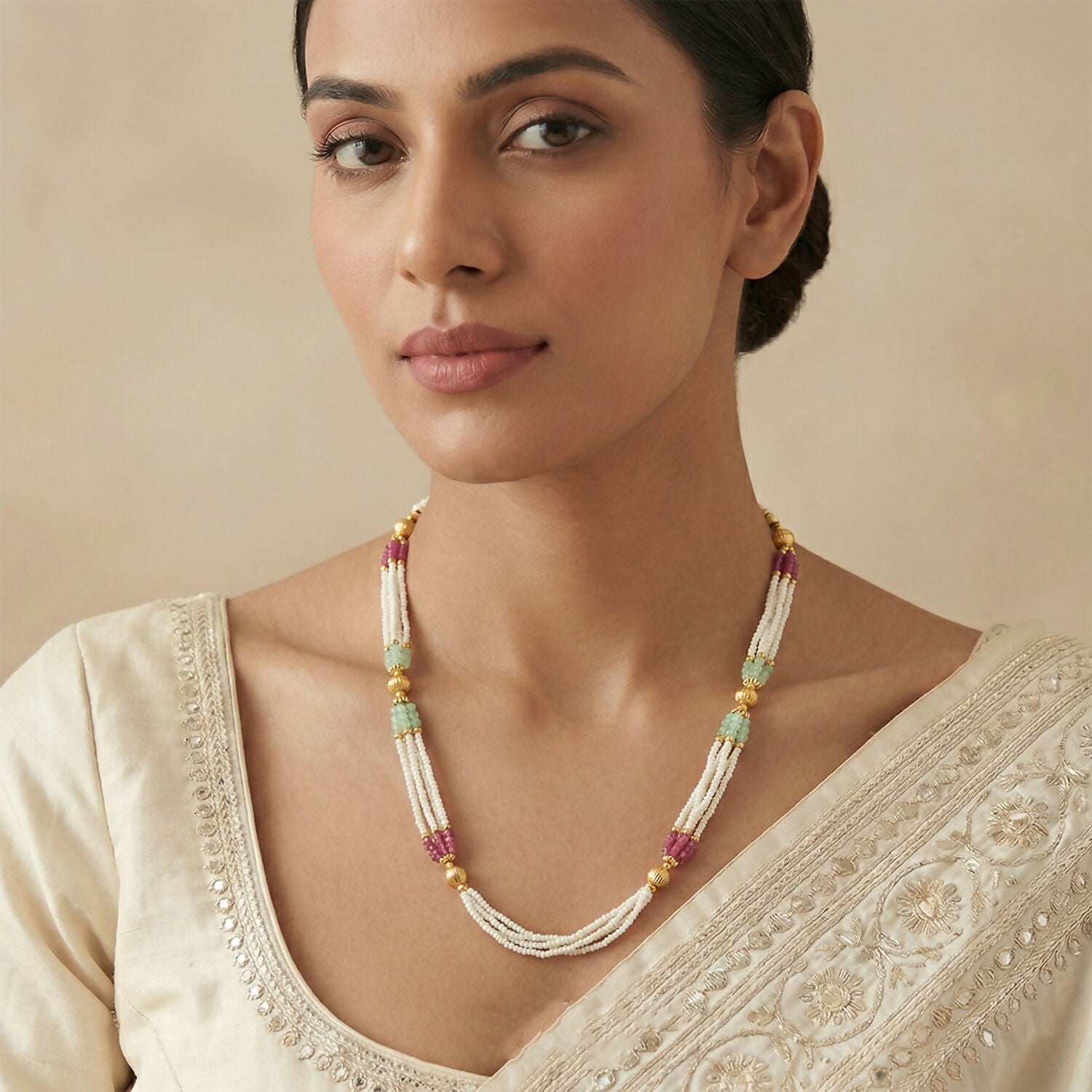 Layered pearl bead strands forming elegant mala necklace