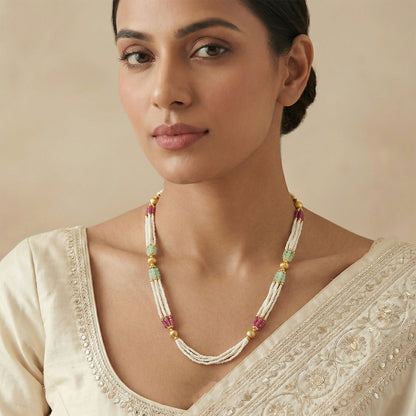 Layered pearl bead strands forming elegant mala necklace