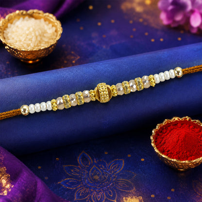 Minimal Pearl Golden Bracelet Rakhi with Sleek Beads and Elegant Red Thread
