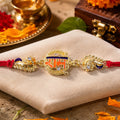 Elegant Rakhi with Ram Plaque, crystal accents and wrist style for Raksha Bandhan