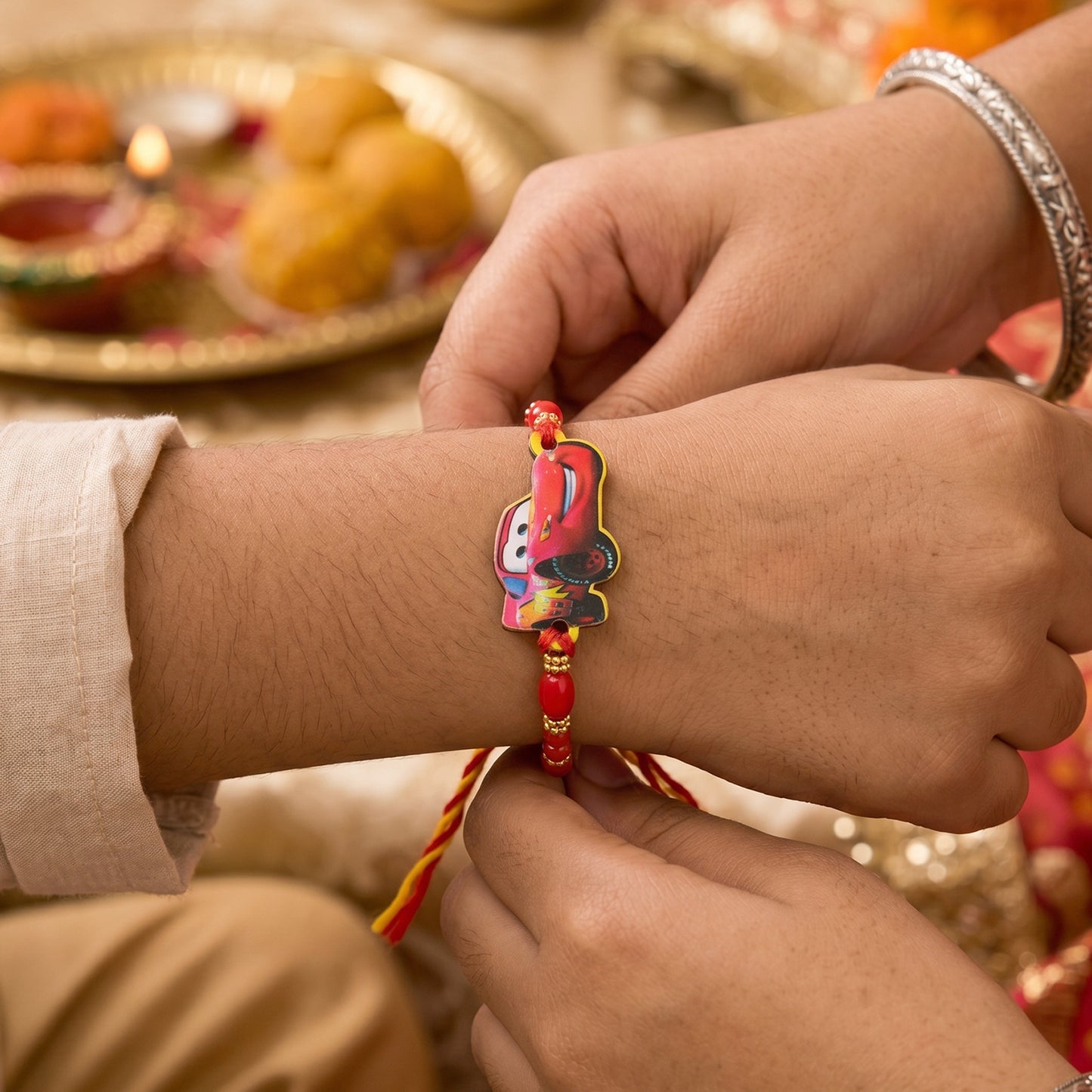 Red Racing Car Kids Rakhi with Gold Beads and Red Thread