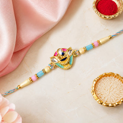 Crown Shaped Kundan Pendant Rakhi with Pink and Teal Enamel