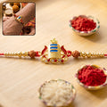 Rakhi – Elegant Gold Shivling with Rudraksha Beads for Bhai
