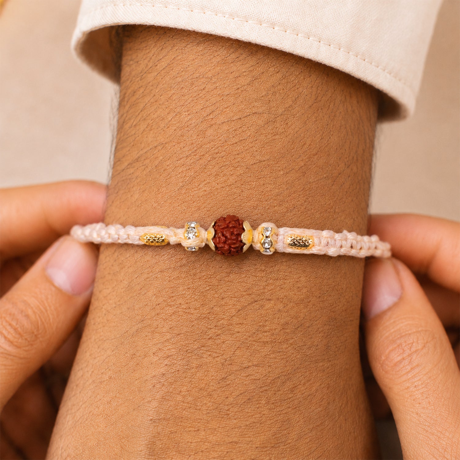 Beautiful Silver Style Rakhi with Soft Beads, Stone Detail and Premium Festive Look