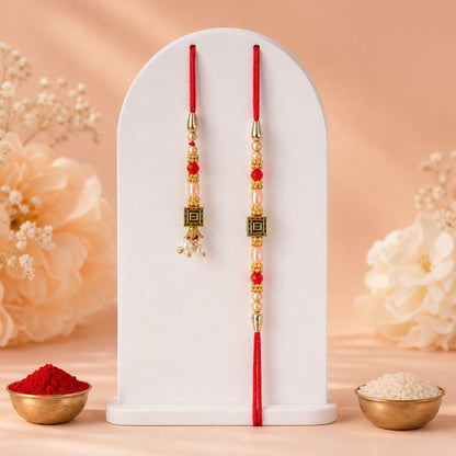 Graceful Circular Medallion Bhai Bhabhi Rakhi with Oval Pendant for Festive Gifting