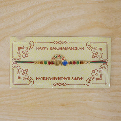 Super Bro Golden Rakhi with Colorful Beads, Blue Charm and Premium Festive Look