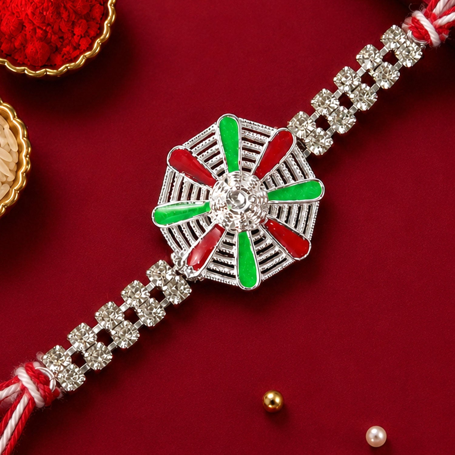 Elegant Rakhi showcasing Chakra Wheel Charm, crystal accents and wrist style for Gift