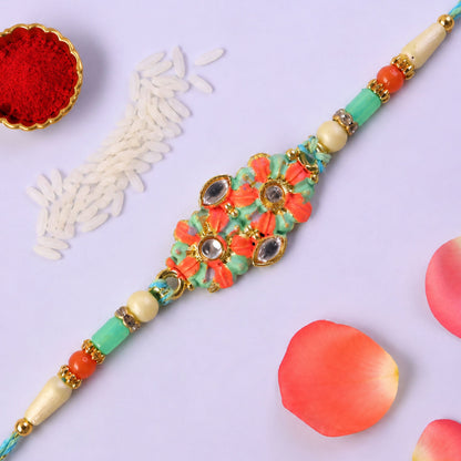 Marigold Style Floral Kundan Pendant Rakhi with Teal Beads