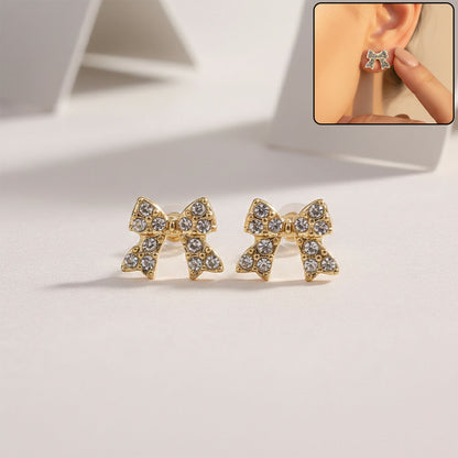 Gold plated crystal bow stud earring front view