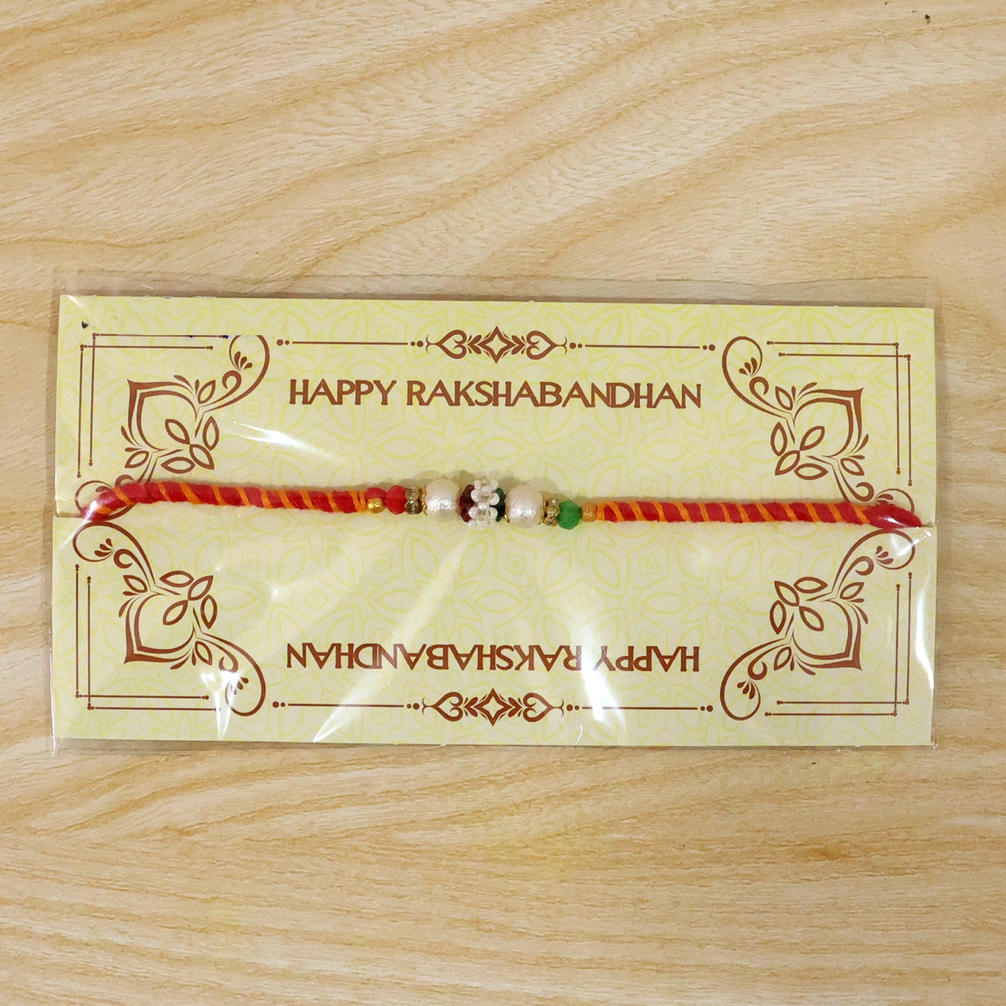 Colorful Golden Stone Rakhi with Bright Beads and Playful Festive Charm