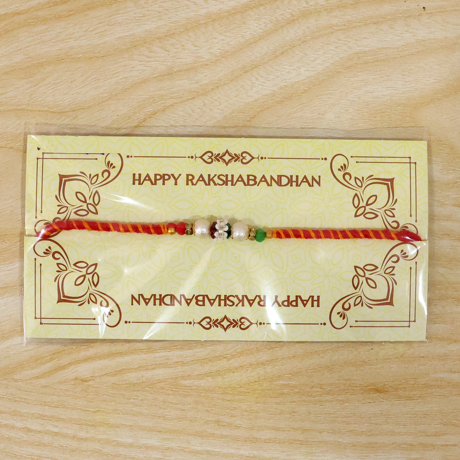 Colorful Golden Stone Rakhi with Bright Beads and Playful Festive Charm