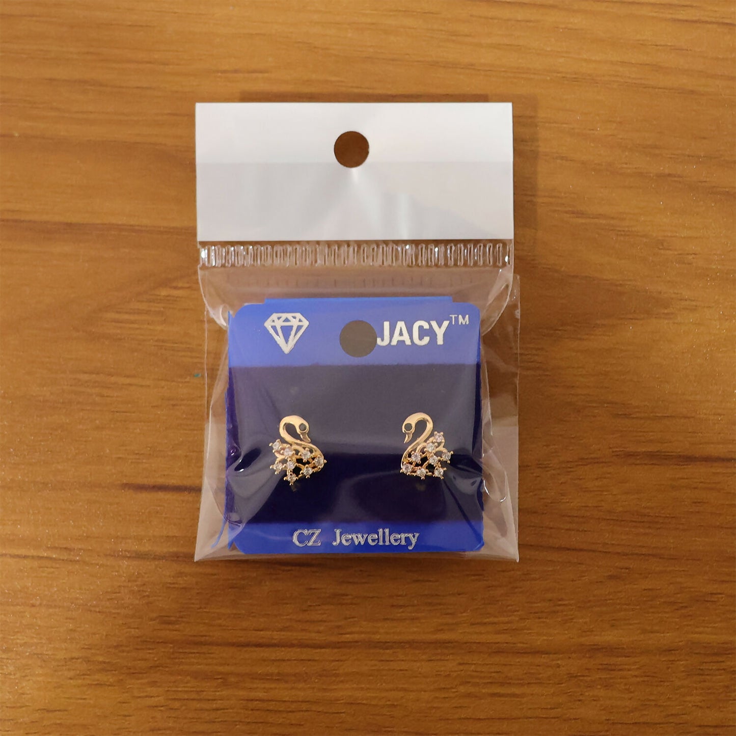 Stylish swan shape CZ stud earrings complementing western outfits