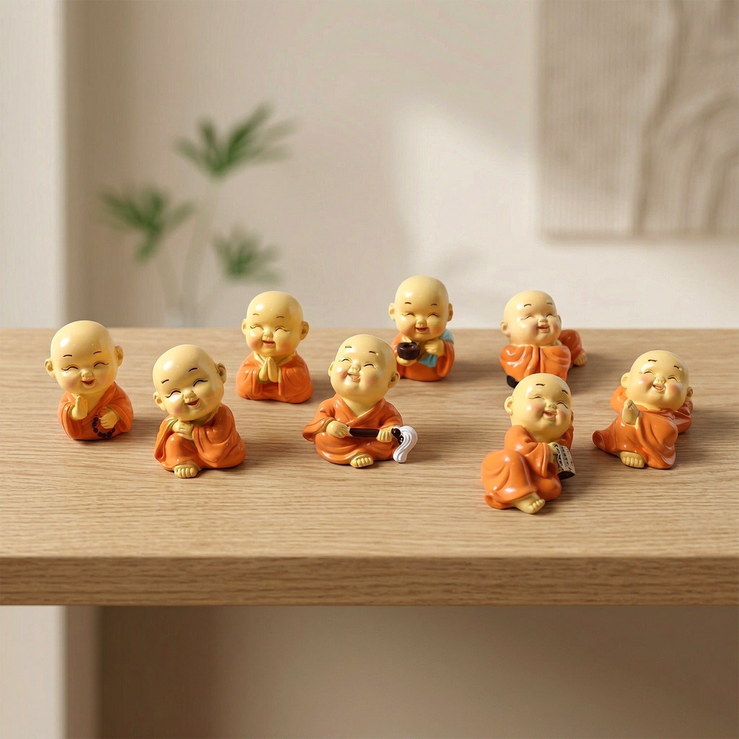 Mini Monk Buddha statue set with joyful expressions